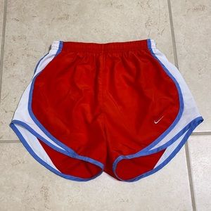 NIKE red and blue running shorts